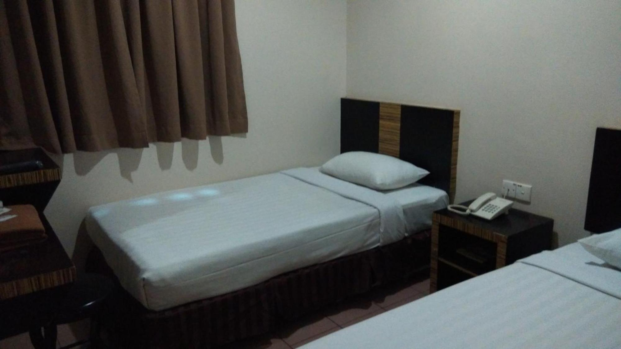 Hotel Traveller Кота Кинабалу Стая снимка