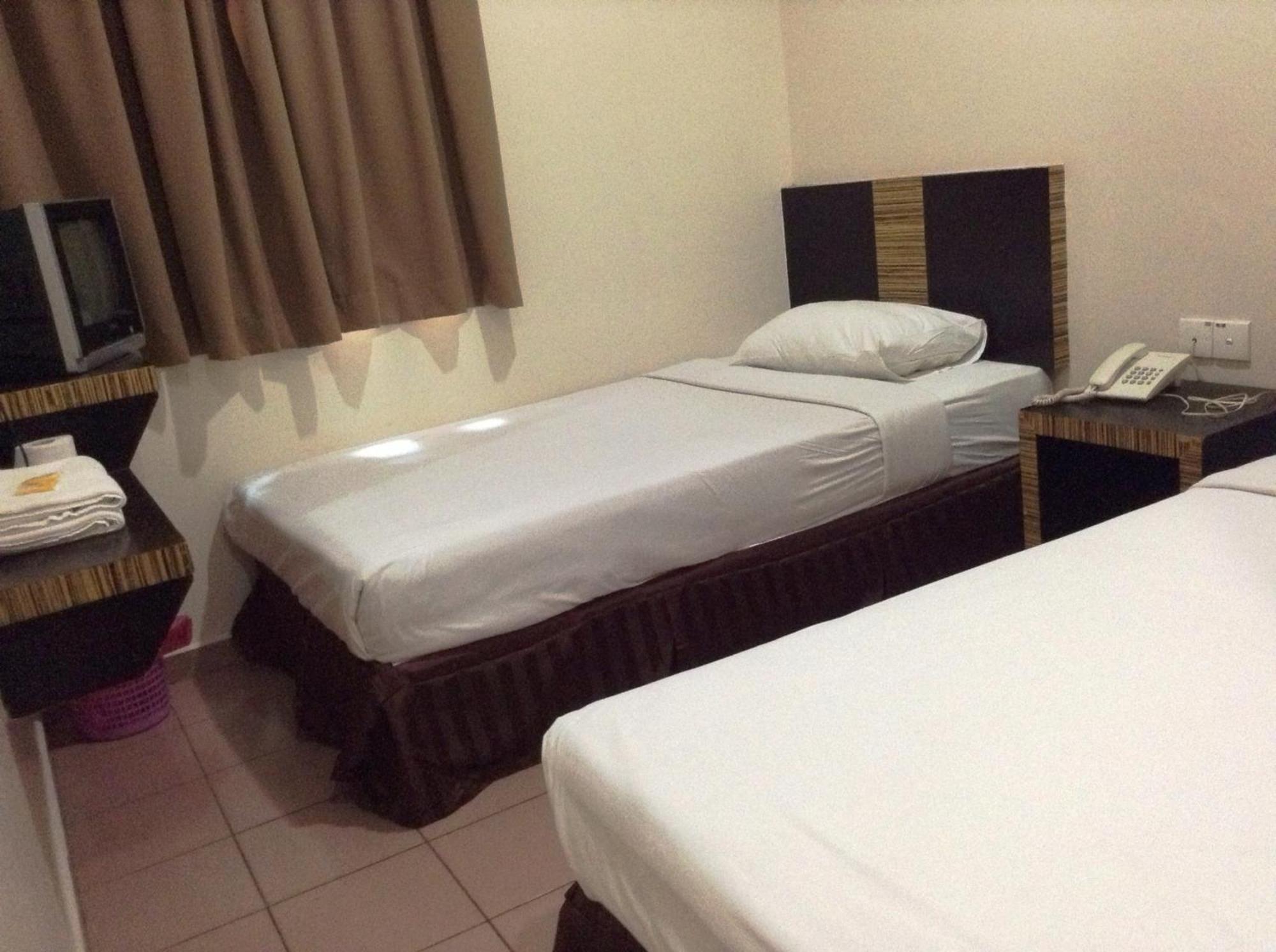 Hotel Traveller Кота Кинабалу Стая снимка