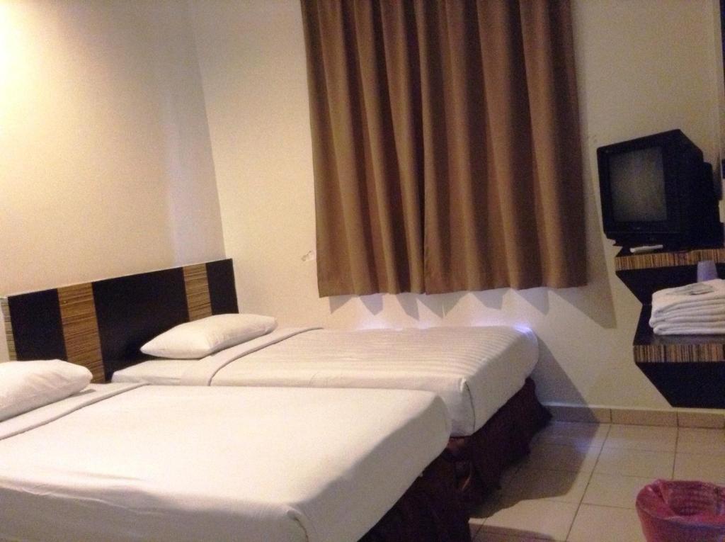 Hotel Traveller Кота Кинабалу Стая снимка